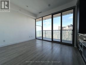 Toronto (Church-Yonge Corridor) condo for rent - A room with a sliding glass door leading to a balcony.