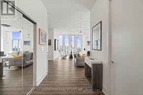 Toronto (Humewood-Cedarvale) condo for rent - A modern living room with a glass door leading to a balcony.