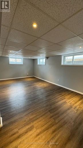 London East (East D) apartment for rent - A room with wooden flooring and white walls.