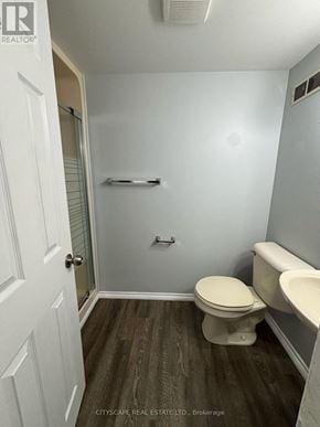 London East (East D) apartment for rent - A bathroom with a toilet, sink, and bathtub.