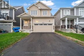 Loyalist (Bath) multi-family for rent - A residential area with houses and a driveway in front.