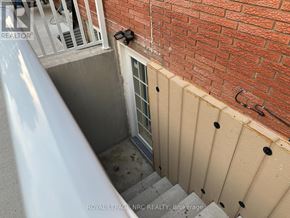 St. Catharines (Vine/Linwell) apartment for rent - A small window is on the side of a building.
