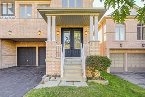 Newmarket (Woodland Hill) apartment for rent - A house with a black front door and a small front porch.