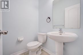 Newmarket (Woodland Hill) apartment for rent - A white toilet sits next to a white sink in a bathroom.