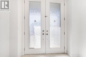 Caledon apartment for rent - A glass door with a pattern on it.