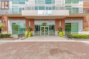 Brampton (Queen Street Corridor) condo for rent - The front of a building with a sign that says "REALTOR" on it.