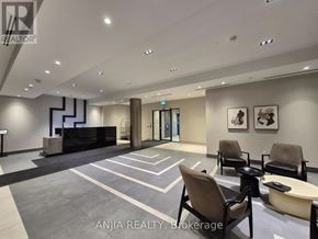 Toronto (Tam O'shanter-Sullivan) condo for rent - A reception area with a black and white checkered floor.