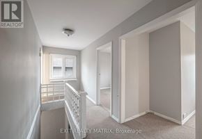 Ottawa apartment for rent - A room with a window and a carpeted floor.