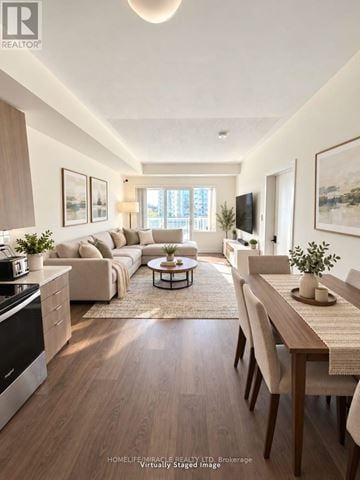 Toronto (Malvern) condo for rent - A modern kitchen with a dining table and chairs.