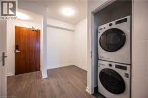 Kitchener condo for rent - A realtor photo of a laundry room with a washer and dryer.