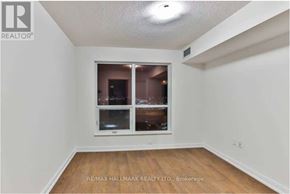 Toronto (Agincourt South-Malvern West) condo for rent - A room with a window and a wooden floor.