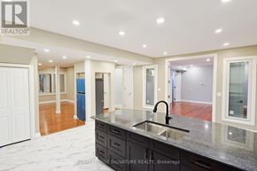 Milton (Cl Clarke) apartment for rent - A kitchen with a sink and a counter top.