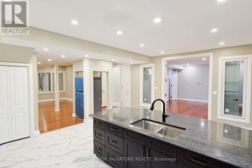 Milton (Cl Clarke) apartment for rent - A kitchen with a sink and a counter top.