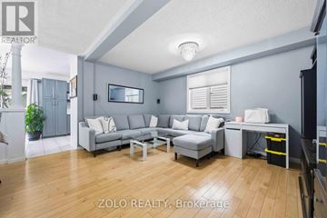 Toronto (West Hill) apartment for rent - A living room with a grey couch and a coffee table.