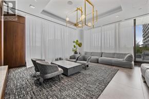 Vaughan (Vaughan Corporate Centre) condo for rent - A modern living room with a grey sofa, a grey armchair, a grey coffee table, and a grey rug.