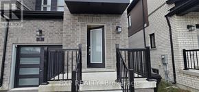 Barrie (Painswick South) townhouse for rent - A house with a black front door and a black railing.