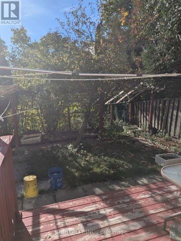 Toronto (L'amoreaux) townhouse for rent - A backyard with a pool and a deck.