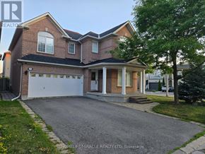 Vaughan (Vellore Village) apartment for rent - A house with a driveway in front of it.