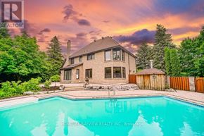 Richmond Hill (South Richvale) apartment for rent - A house with a pool in front of it is for sale.