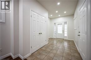 Waterloo apartment for rent - A white door is in a room with tile flooring.