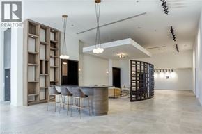 Cambridge condo for rent - A modern living room with a bar area and a staircase.