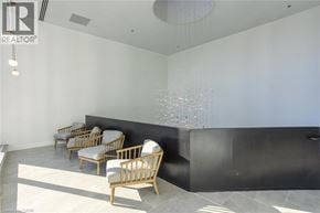 Cambridge condo for rent - A room with a row of chairs and a wall hanging.