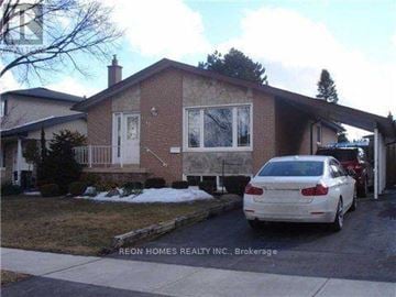 Toronto (Woburn) apartment for rent - A white car is parked in front of a house.