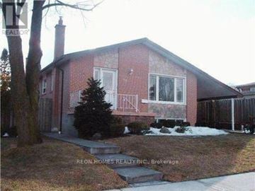 Toronto (Woburn) apartment for rent - A house with a red brick exterior and a chimney is shown.
