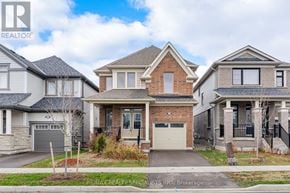 Centre Wellington (Fergus) apartment for rent - Three houses are shown in the image.