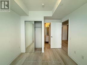 Toronto (Mount Pleasant West) condo for rent - A white interior with a doorway leading to another room.