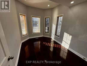 Brampton (Northwest Sandalwood Parkway) apartment for rent - A room with EXP REALTY, Brokerage written on the floor.