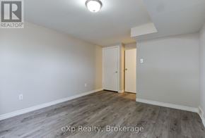 London East (East I) apartment for rent - A room with a white door and a light on the ceiling.