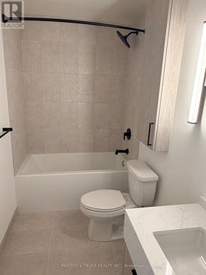 Toronto (Forest Hill South) condo for rent - A white toilet sits next to a bathtub in a bathroom.