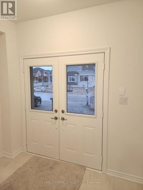 Brant (Paris) apartment for rent - A white double door with a window in the middle.