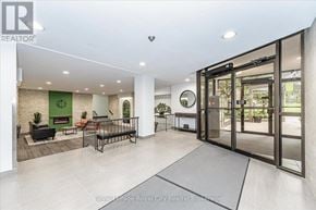 Guelph (Willow West/Sugarbush/West Acres) condo for rent - A spacious living room with a fireplace and a couch.