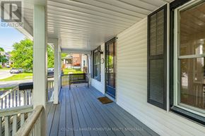 Niagara Falls (Downtown) apartment for rent - A porch with a blue mat on it.