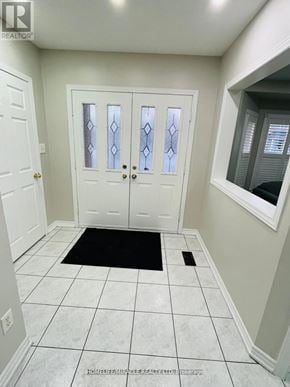 Brampton (Sandringham-Wellington) apartment for rent - A white door with a glass panel and a black doormat in front of it.