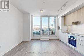Toronto (Banbury-Don Mills) condo for rent - A spacious kitchen with a view of the city.
