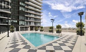 Toronto (Humber Heights) condo for rent - A pool surrounded by a black and white checkered floor.
