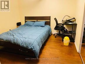 Toronto (Annex) multi-family for rent - A bedroom with a bed, desk, and chair.
