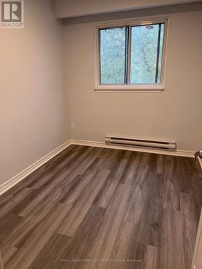 Toronto (Humewood-Cedarvale) apartment for rent - A room with wooden flooring and a window.