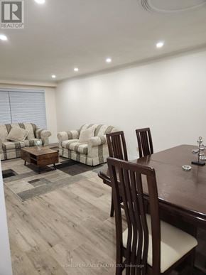 Toronto (Glenfield-Jane Heights) apartment for rent - A living room with a couch, chairs, and a coffee table.