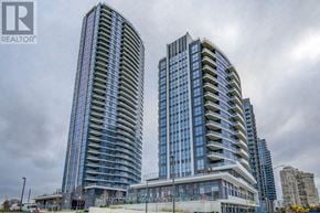 Mississauga (Hurontario) condo for rent - Two modern high-rise buildings with glass facades are under construction.