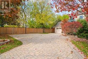 Niagara-On-The-Lake (Town) apartment for rent - A backyard with a basketball hoop and a fence.