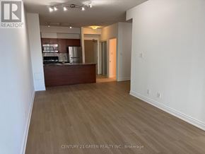 Mississauga (City Centre) condo for rent - A realtor brokerage office with a kitchen area in the back.