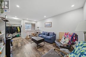 Ottawa townhouse for rent - A living room with a blue couch and a coffee table.
