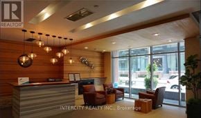 Toronto (Niagara) condo for rent - A reception area with a desk and chairs.
