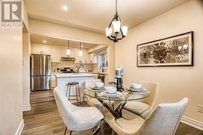 Hamilton (Gilkson) apartment for rent - A dining room with a glass table and chairs.