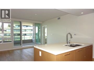 West Vancouver apartment for rent - A modern kitchen with a sink and a window.