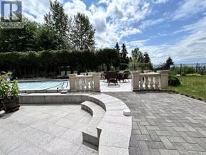 West Vancouver apartment for rent - A backyard with a pool and patio furniture.